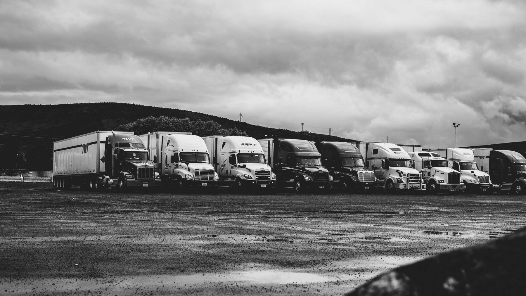 Fleet vehicles supporting industrial transport assignments